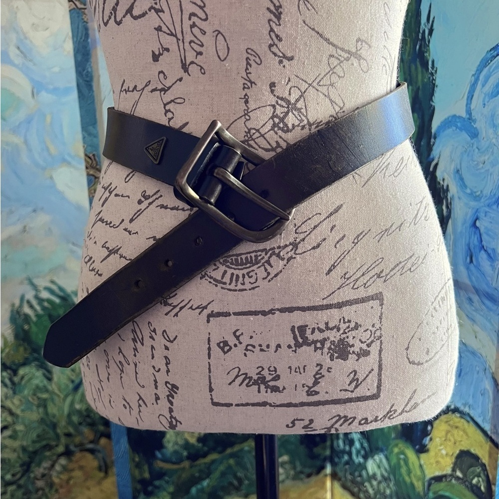 Guess 35” long, 1 1/4” wide, brown leather belt.